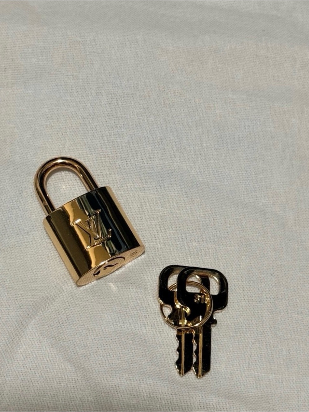 Louis Vuitton Gold Padlock with Matching Keys